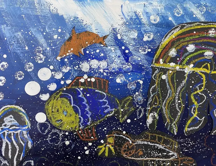 A deep blue underwater scene with light rays, a dolphin, a patterned fish and jellyfish