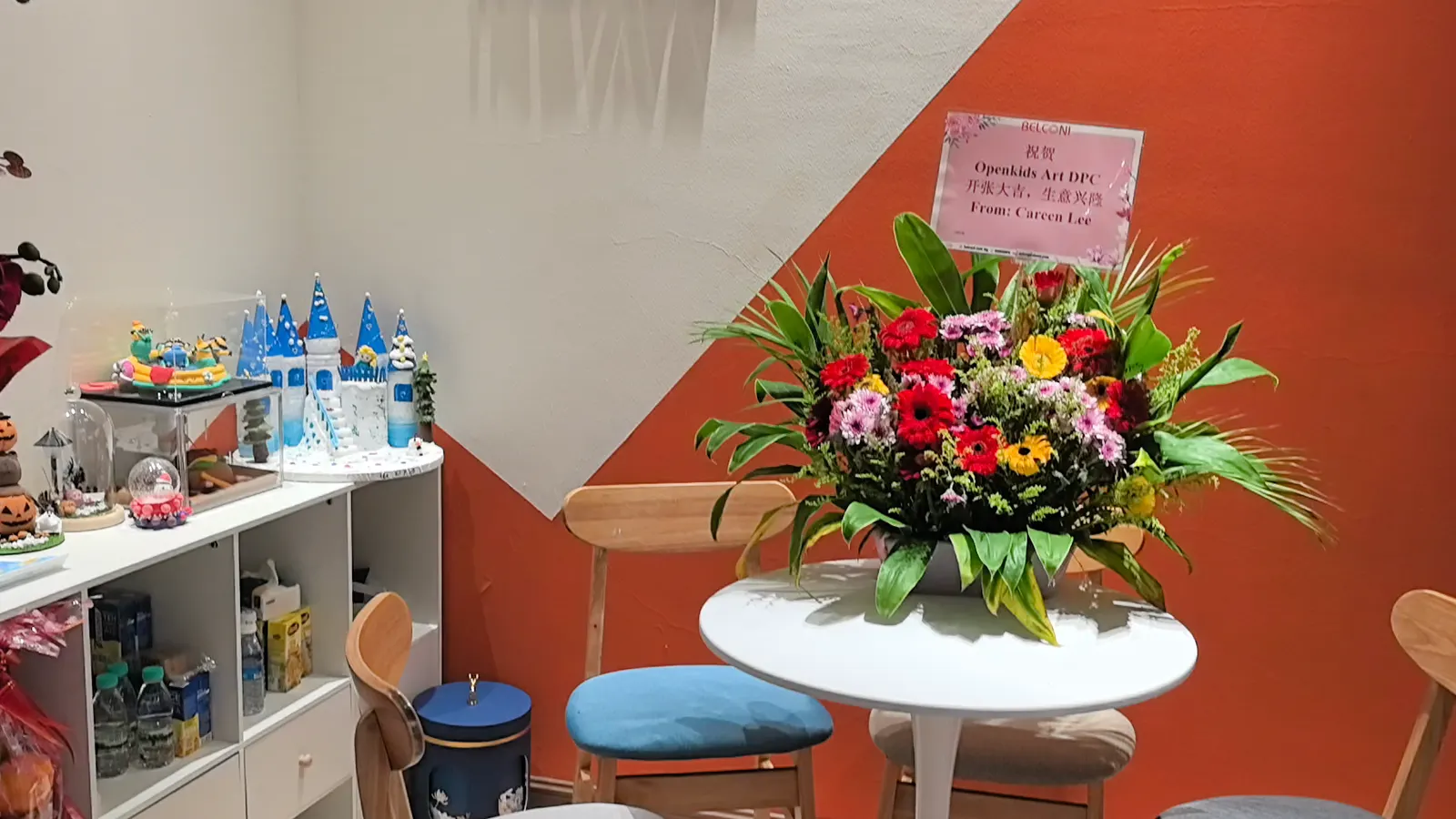 The reception corner with the craft display shelf