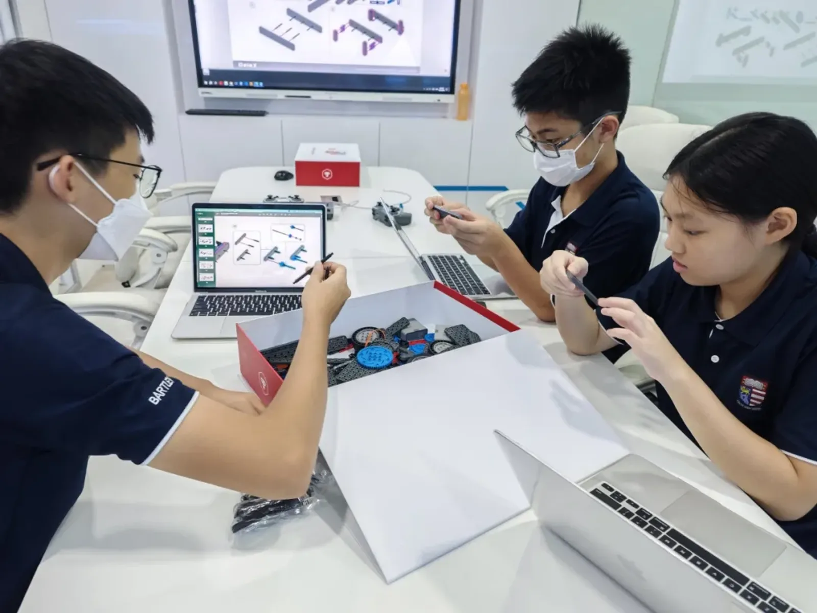 Futurum Academy students building their VEX robots in class