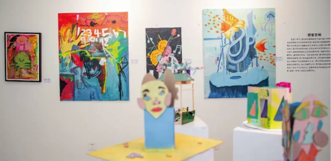 Colourful paintings and sculptural displays · Source article image