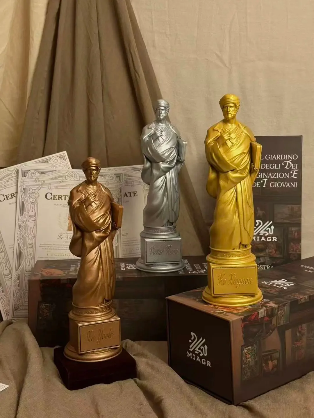 Marco Polo art award trophies and certificate samples · Source article image